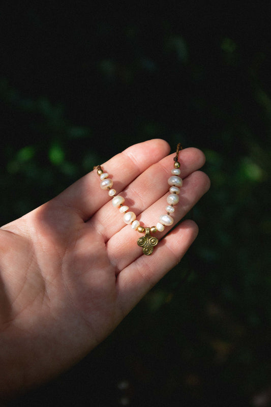 Upcycled freshwater pearls and brass charm